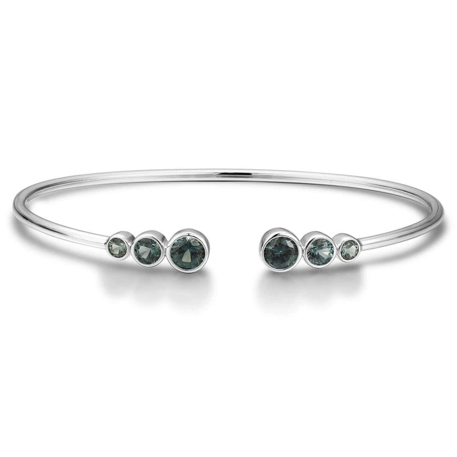 Open cuff bracelet of S925 silver with grey - green sapphires, round gems, open design for comfortable fit.