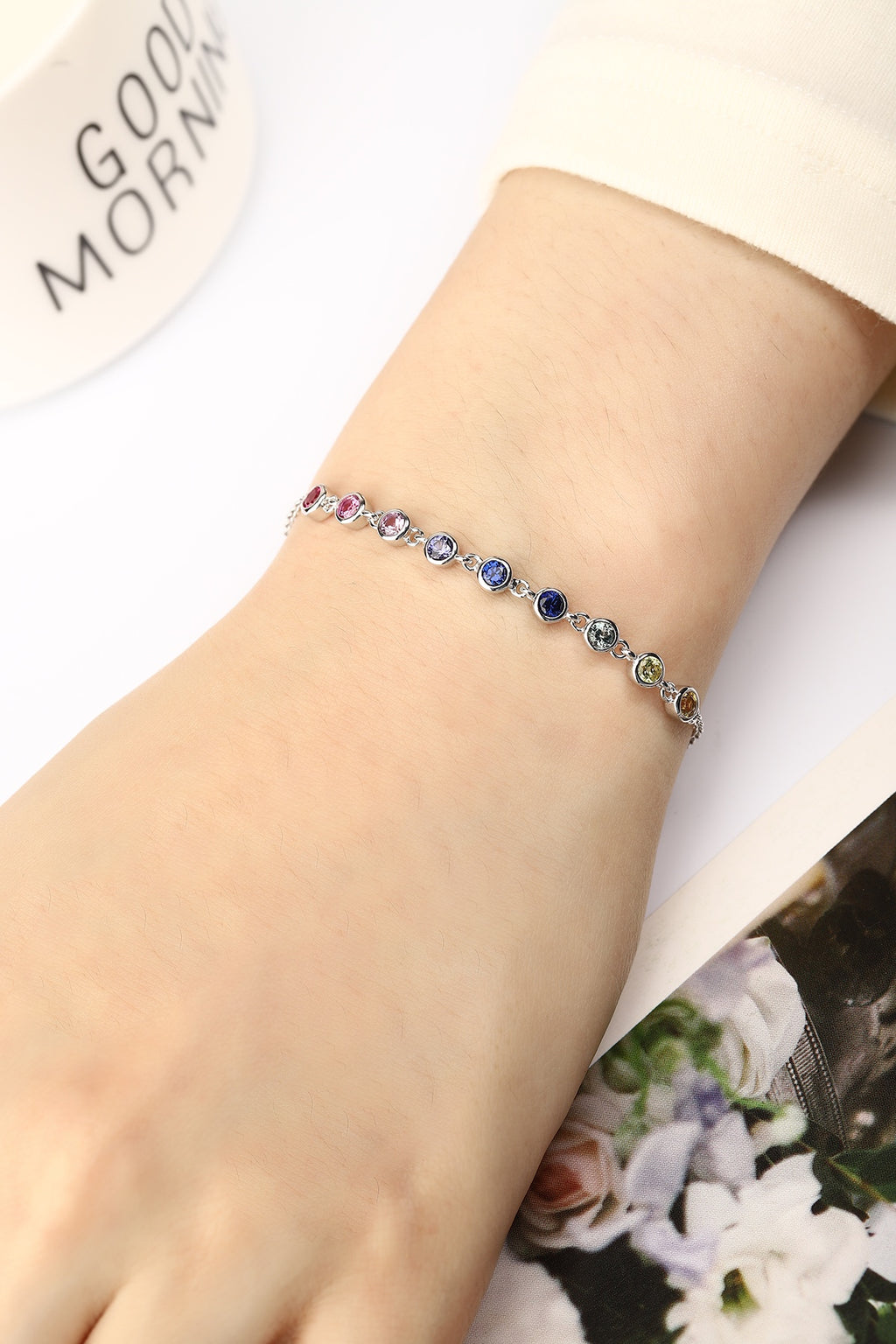 Made of S925 silver, colorful sapphires shine, round - shaped, with extender and clasp, lovely.
