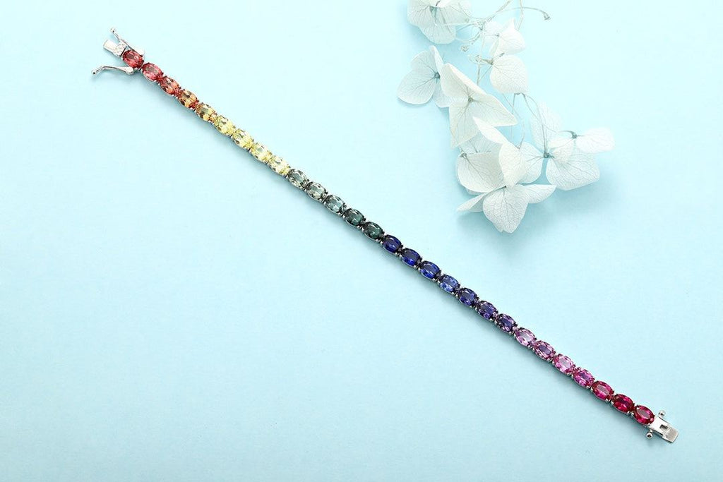 S925 silver brace, multi - hued sapphires, oval gems, box - style clasp, 18cm chain, pretty.