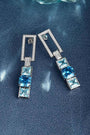S925 silver earrings, well-made clasp. Feature diamond rectangles and square blue lab-grown diamonds, sleek geometric shape.
