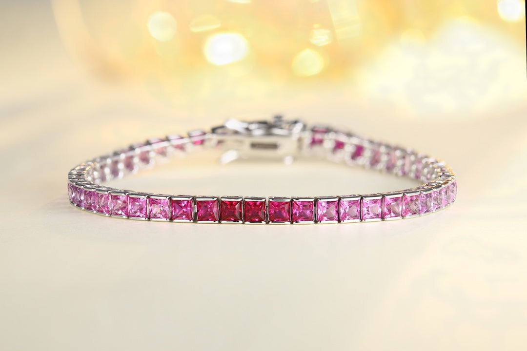 This bracelet uses S925 silver with a simple and sturdy clasp design. Lab-grown colored sapphires display pink-purple charm c