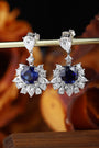 The S925 silver stud earrings have practical clasps. The lab-grown sapphire main stones have a rich color, with royal blue an