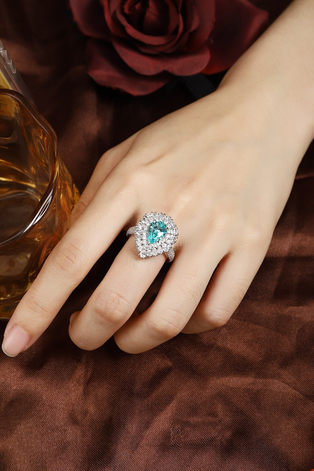 This S925 silver ring has a closed - ring structure. Features a round vivid blue lab - grown gem with diamond frame, no openi