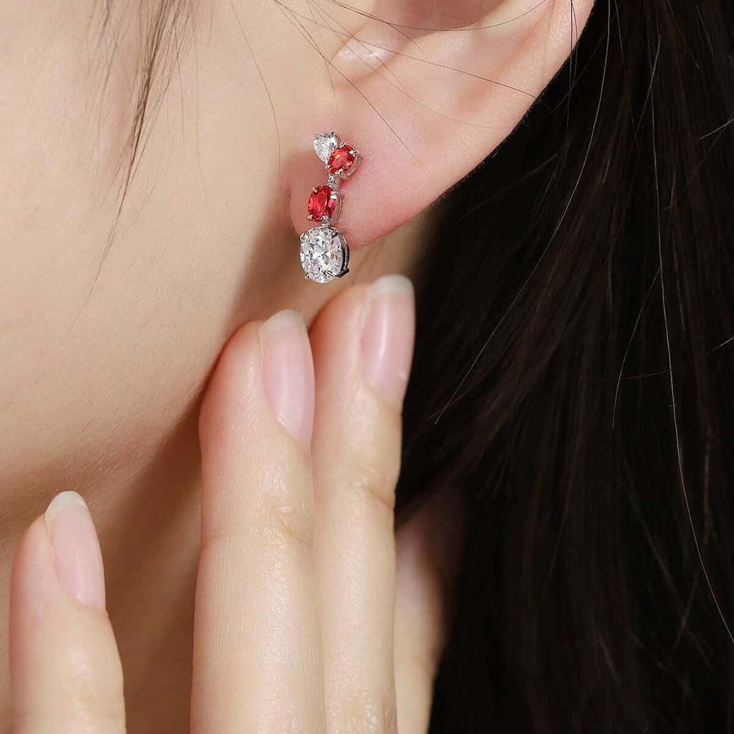 Made of S925 silver, these earrings have a practical clasp design. The square - shaped red lab - grown gemstones with rich co