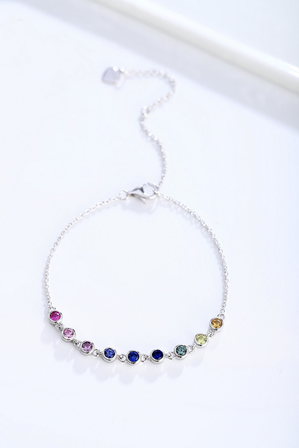 S925 silver piece, colorful sapphires arranged, round form, clasp with extender, charming.