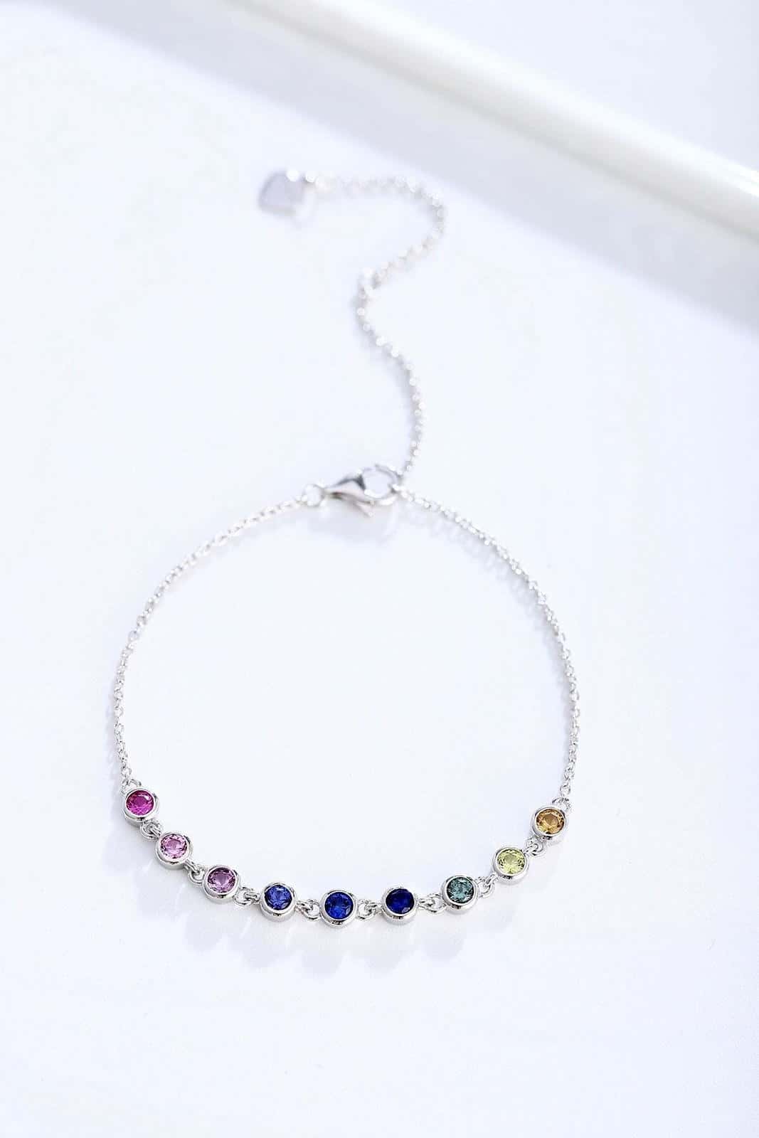 S925 silver piece, colorful sapphires arranged, round form, clasp with extender, charming.