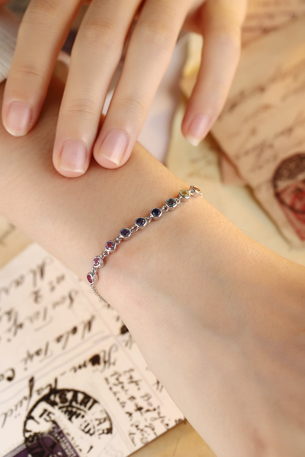 S925 silver jewelry, vibrant sapphire colors, round beads, clasp & extender design, chic.